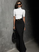 Women's two piece skirt set featuring a stylish turtleneck top and a modern black and white midi skirt, perfect for chic casual or semi-formal occasions 2