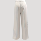 Women's wide leg pants with a high waist, featuring functional pockets, elegantly tailored in a stylish black and white design. 1