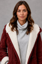 Women's winter coat featuring a fleece-lined interior, designed for a smart-casual flattering fit, perfect for everyday wear in cold weather. 2