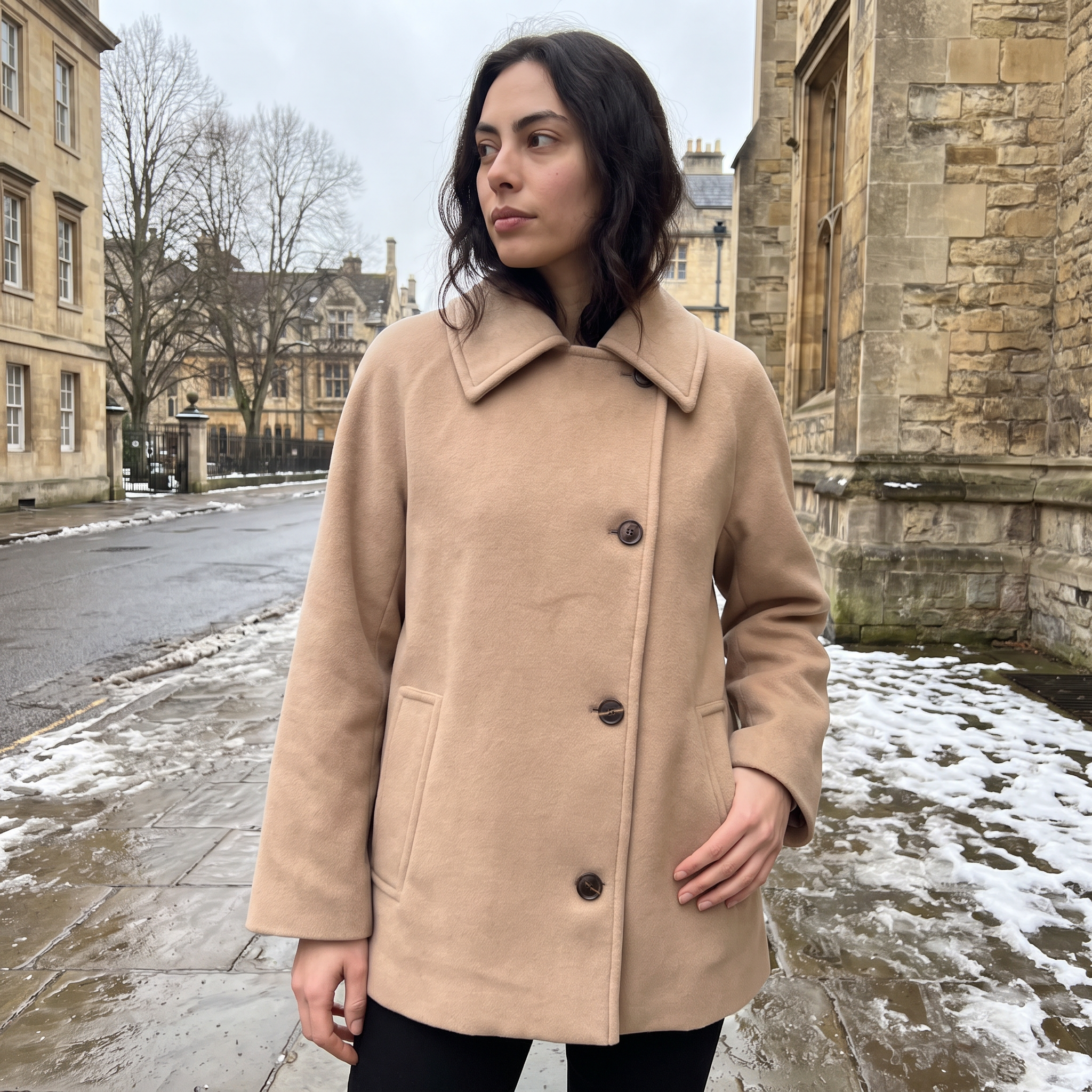 Women’s oversized wool blend coat featuring front button fastening, perfect for winter fashion and warmth. 1