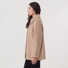 Women’s oversized wool blend coat featuring front button fastening, perfect for winter fashion and warmth. 4