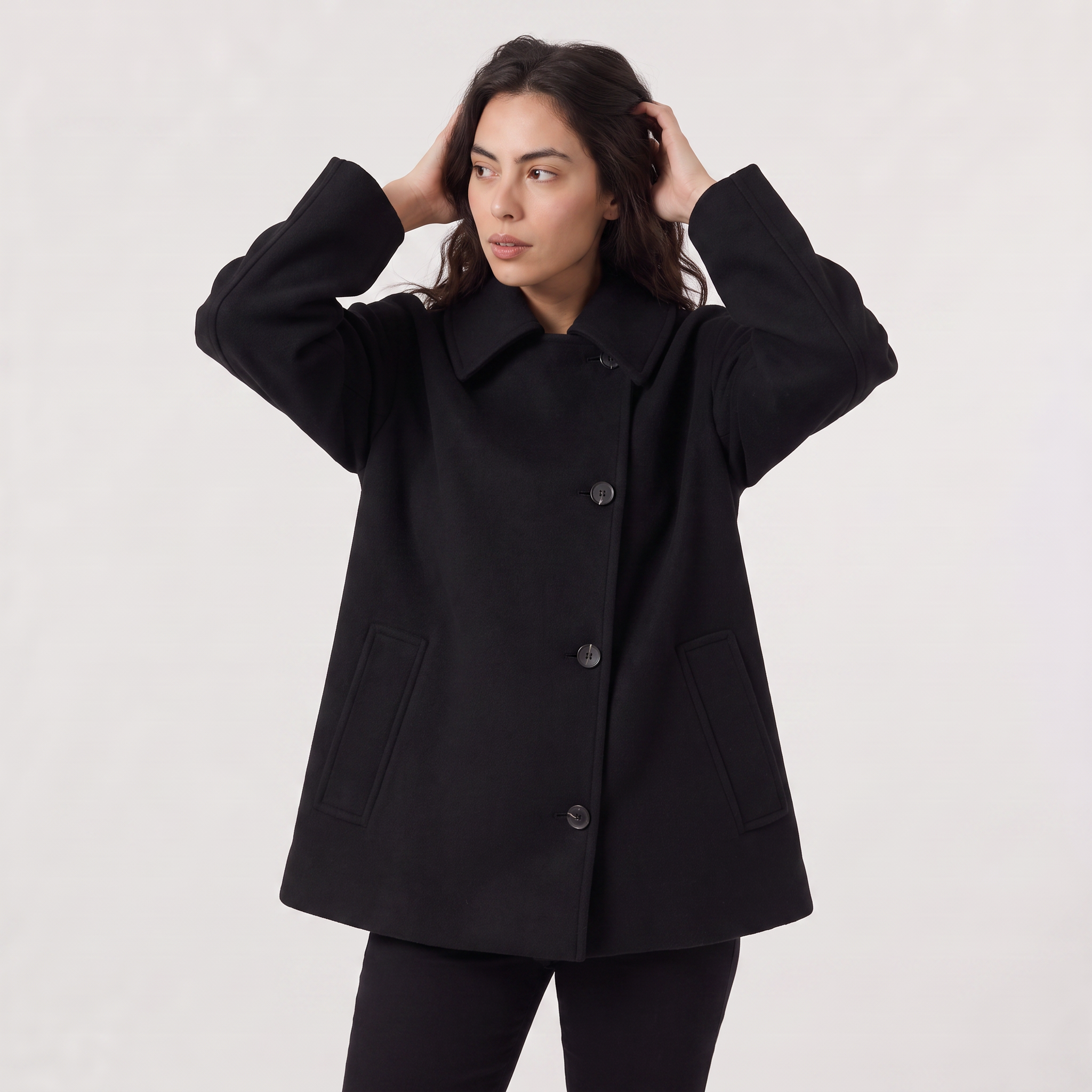 Women’s oversized wool blend coat featuring front button fastening, perfect for winter fashion and warmth. 8