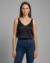 Elegant women's camisole top featuring a V-neckline and wide straps, crafted from luxurious satin fabric for a relaxed fit, perfect for layering or wearing alone 0