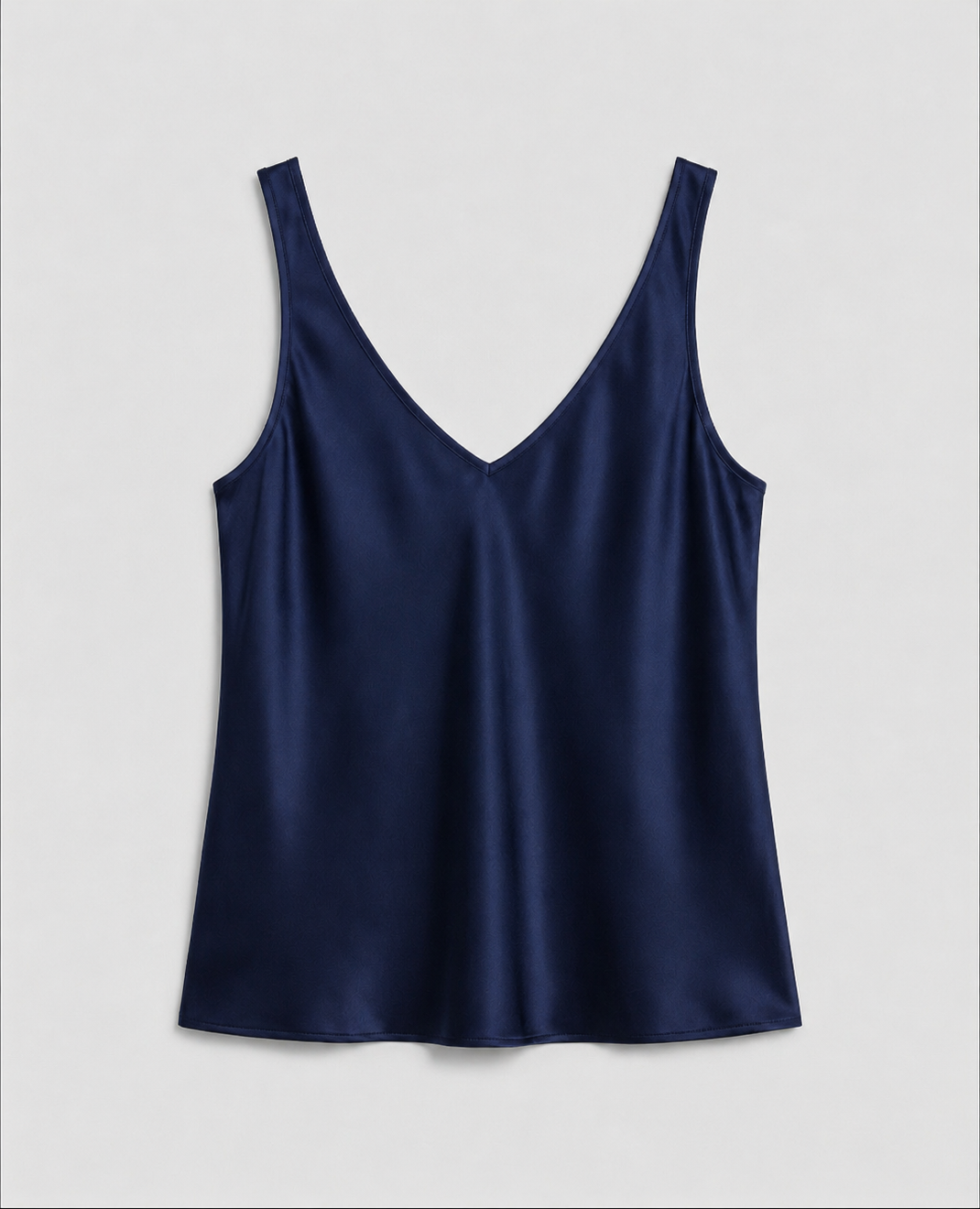 Elegant women's camisole top featuring a V-neckline and wide straps, crafted from luxurious satin fabric for a relaxed fit, perfect for layering or wearing alone 9