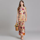 Womens elegant midi length dress featuring floral embroidery and a high neckline, perfect for summer wedding guests. 2