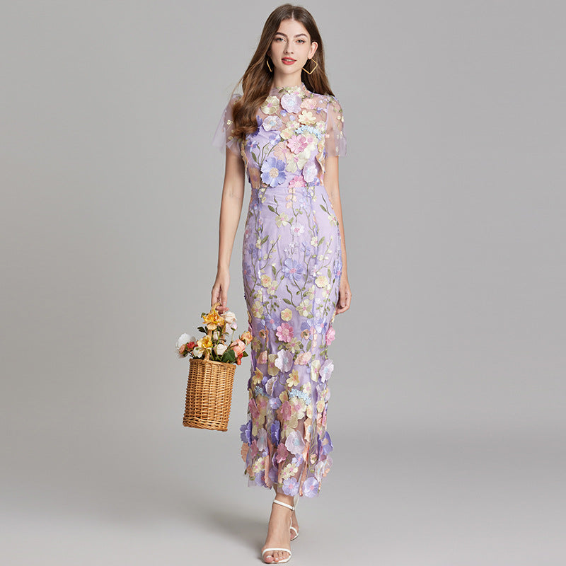 Womens elegant midi length dress featuring floral embroidery and a high neckline, perfect for summer wedding guests. 3
