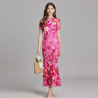 Womens elegant midi length dress featuring floral embroidery and a high neckline, perfect for summer wedding guests. 4