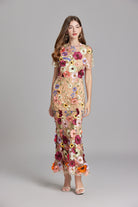 Womens elegant midi length dress featuring floral embroidery and a high neckline, perfect for summer wedding guests. 8