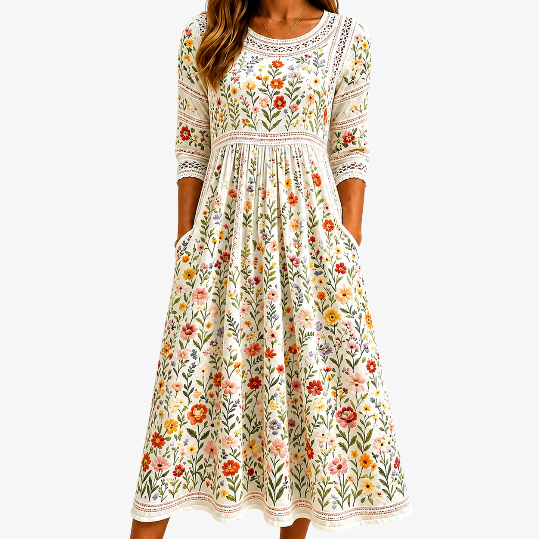Womens floral summer midi dress featuring lace details and convenient side pockets, perfect for casual outings. 0