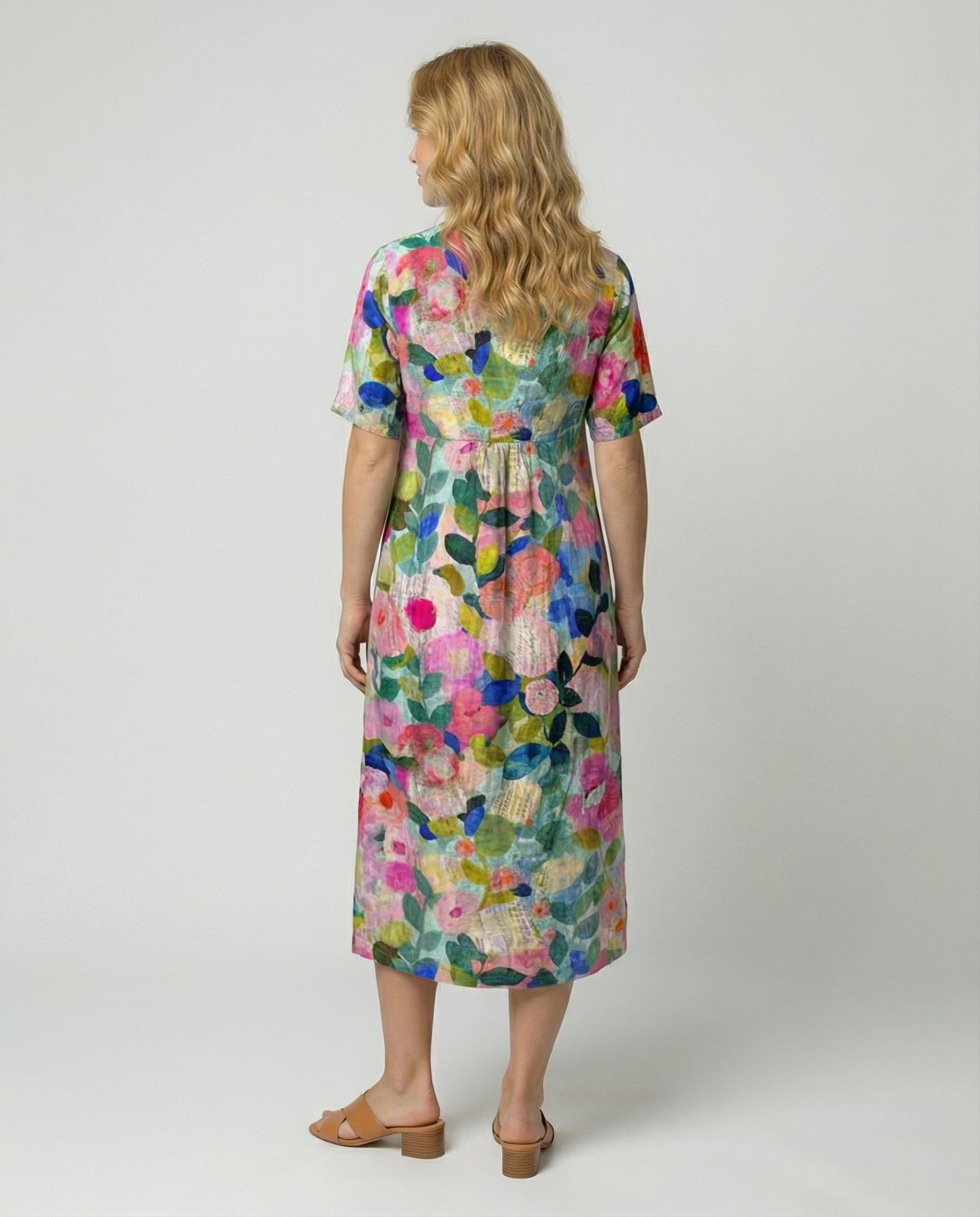 Womens floral linen midi dress featuring a V-neck and short sleeves, perfect for summer casual wear. 1