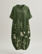 Womens floral linen midi dress featuring a V-neck and short sleeves, perfect for summer casual wear. 6