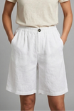 Womens linen shorts featuring an elastic waist and side pockets, designed for a relaxed fit perfect for warm weather. 9