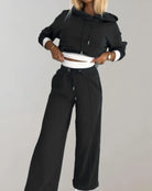 Womens loungewear set featuring a stylish hoodie and comfortable joggers, perfect for cozy casual wear in a modern design. 0
