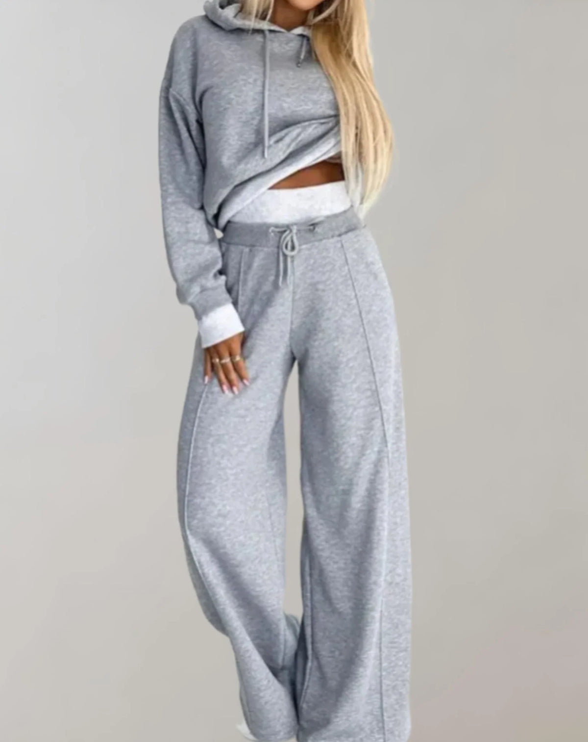 Womens loungewear set featuring a stylish hoodie and comfortable joggers, perfect for cozy casual wear in a modern design. 2