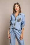 Womens pyjamas set featuring a relaxed fit, made from soft breathable fabric, with full-length trousers available in pink or blue. 0