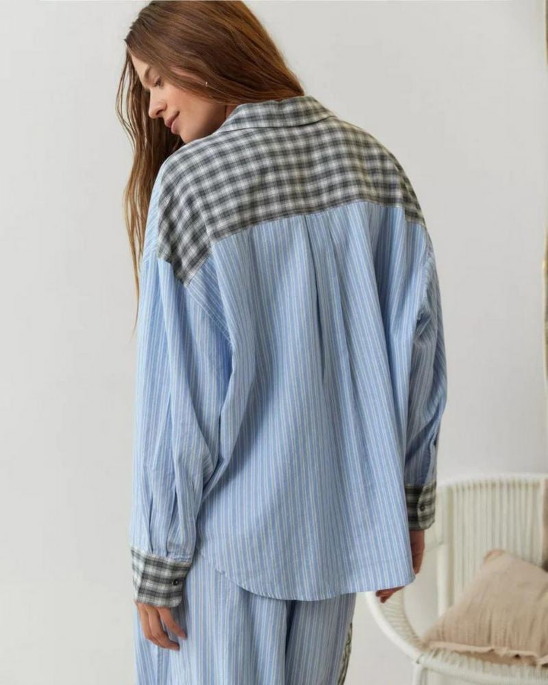 Womens pyjamas set featuring a relaxed fit, made from soft breathable fabric, with full-length trousers available in pink or blue. 7