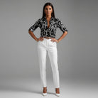 Womens lightweight printed blouse featuring a classic collar and roll-up sleeves, designed for a relaxed fit ideal for casual or semi-formal occasions. 1