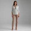 Womens lightweight printed blouse featuring a classic collar and roll-up sleeves, designed for a relaxed fit ideal for casual or semi-formal occasions. 2