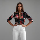 Womens lightweight printed blouse featuring a classic collar and roll-up sleeves, designed for a relaxed fit ideal for casual or semi-formal occasions. 3