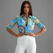 Womens lightweight printed blouse featuring a classic collar and roll-up sleeves, designed for a relaxed fit ideal for casual or semi-formal occasions. 5