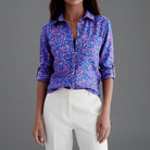Womens lightweight printed blouse featuring a classic collar and roll-up sleeves, designed for a relaxed fit ideal for casual or semi-formal occasions. 7