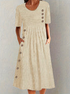 Womens summer dress featuring a striped design, midi length, and breathable fabric for an elegant and comfortable fit. 3