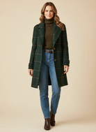 Elegant women's wool check coat featuring a soft lining and stylish lapel collar, perfect for winter outerwear. 0