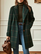 Elegant women's wool check coat featuring a soft lining and stylish lapel collar, perfect for winter outerwear. 2
