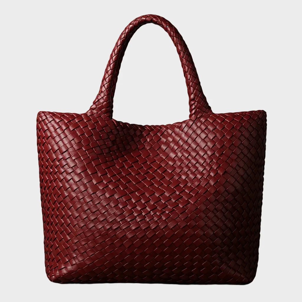 Woven leather tote bag featuring a spacious interior and comfortable handles, perfect for daily use and stylish outings. 3