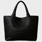 Woven leather tote bag featuring a spacious interior and comfortable handles, perfect for daily use and stylish outings. 7